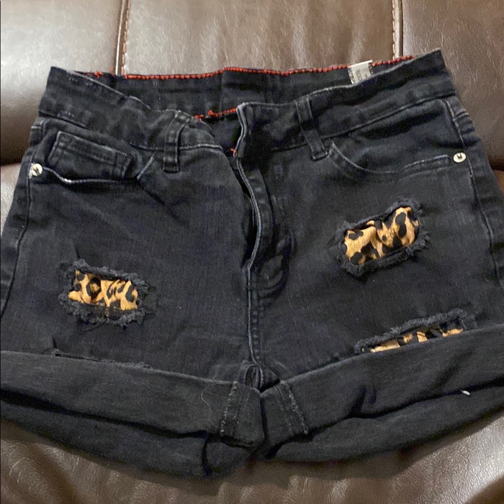 Stylish Black Denim Shorts with Leopard Accents